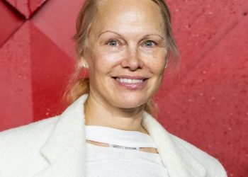 Pamela Anderson Takes on Paris Fashion Week With No Makeup