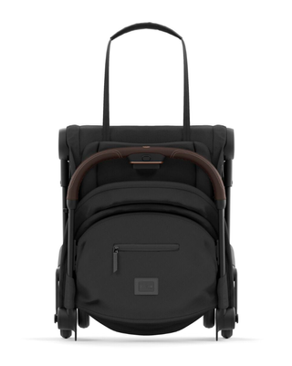 Cybex Coya travel stroller all folded up thanks to the clever one-handed folding design