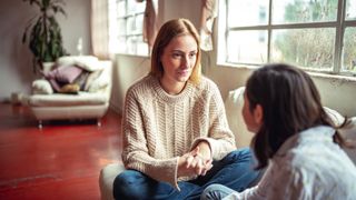 Mum talking to daughter