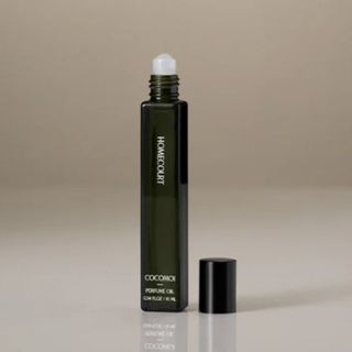 Homecourt Cocomoi perfume oil, pictured on a white background