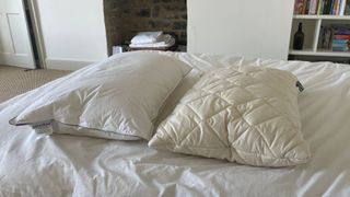 Naturalmat The Wool and Down Pillow next to the Woolroom Wool Pillow