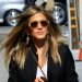 Jennifer Aniston gives masterclass in styling white jeans with oversized blazer, leather boots and timeless designer handbag