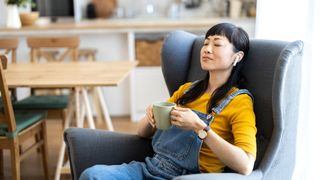woman listening to podcast