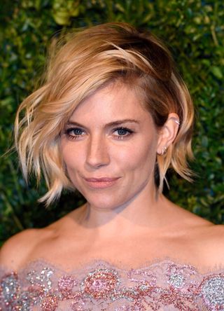 Sienna Miller attends the 60th London Evening Standard Theatre Awards at London Palladium on November 30, 2014 in London, England