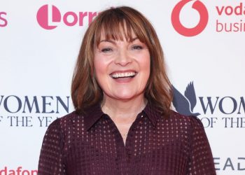 Lorraine Kelly exudes class in cocoa-toned midi dress