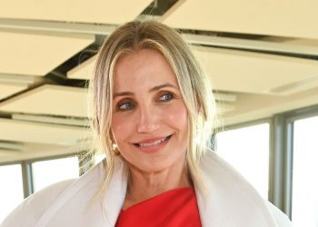 Cameron Diaz’s romantic red satin, unique pumps and brick-toned eyeshadow scream bold colour confidence