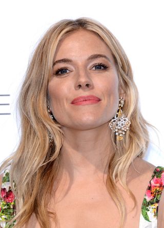Sienna Miller attends the BMW i3 global reveal party held at Old Billingsgate Market on July 29, 2013 in London, England