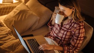 woman wearing pyjamas in bed
