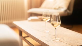 two wine glasses on coffee table