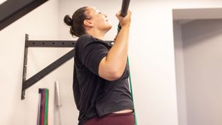 Woman doing chin up