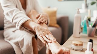 woman moisturising