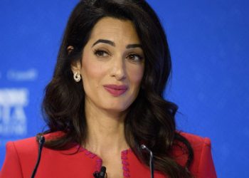 Amal Clooney’s red pencil dress and matching jacket make perfect occasion wear for transitional months between winter and spring