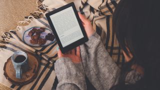 woman reading kindle