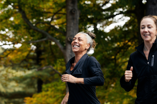 two women running