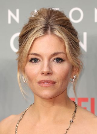 Sienna Miller attends the World Premiere of Anatomy Of A Scandal at the Curzon Mayfair on April 14, 2022 in London, England