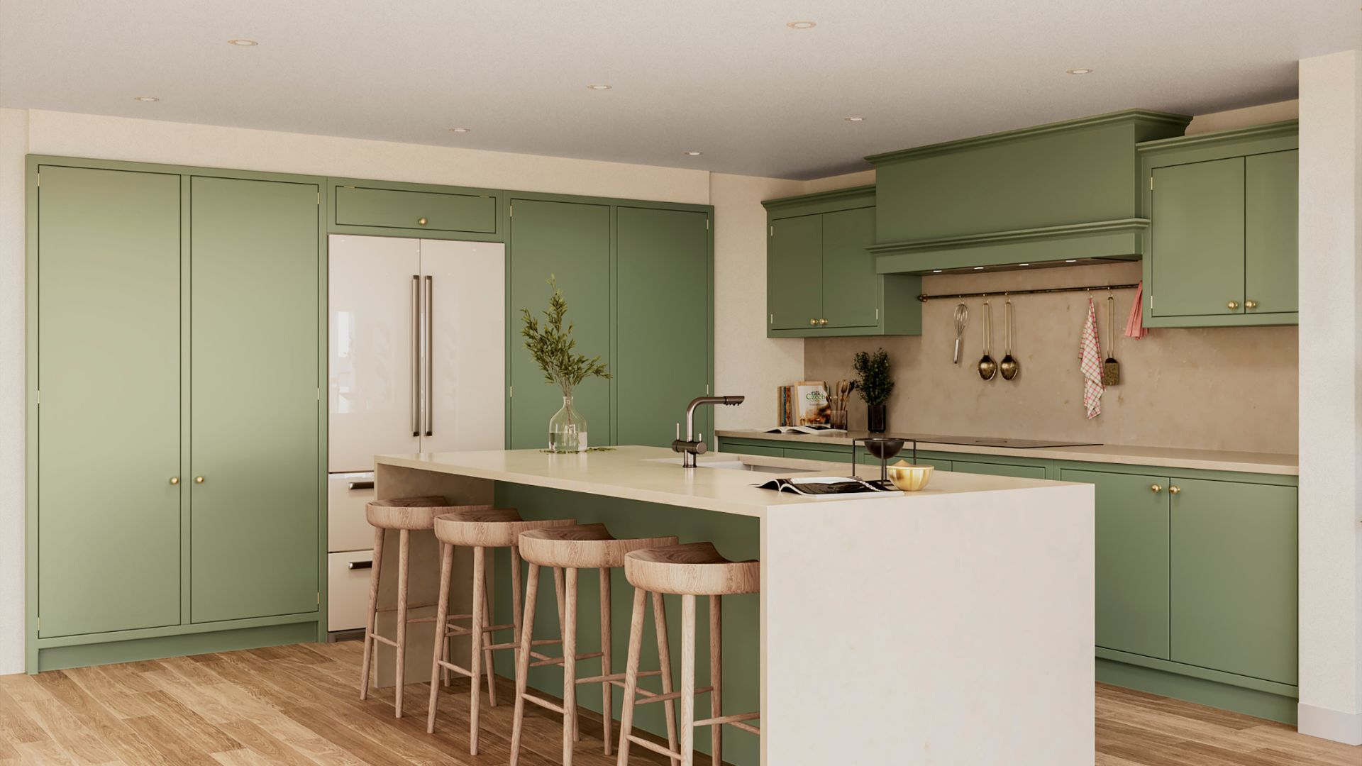 A pistachio green kitchen with galley island and stools