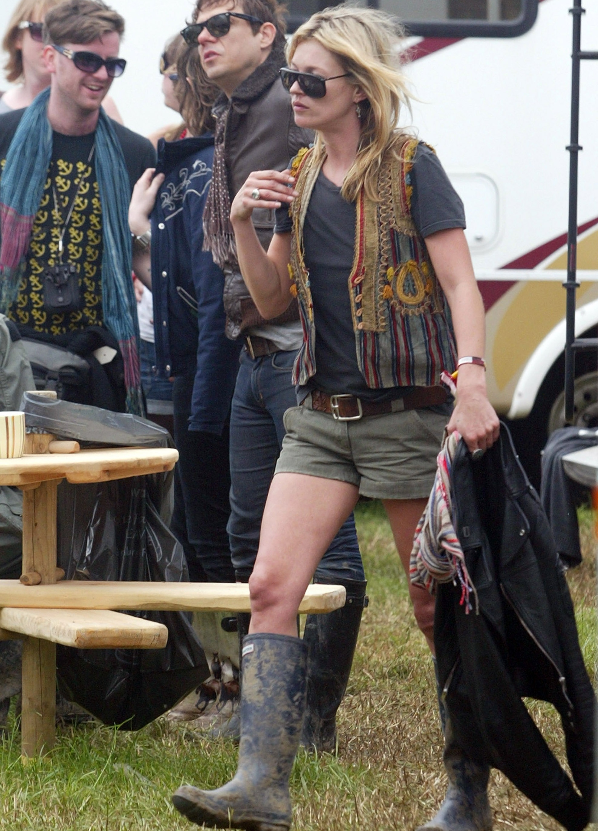Kate Moss wearing a waistcoat at Glasto
