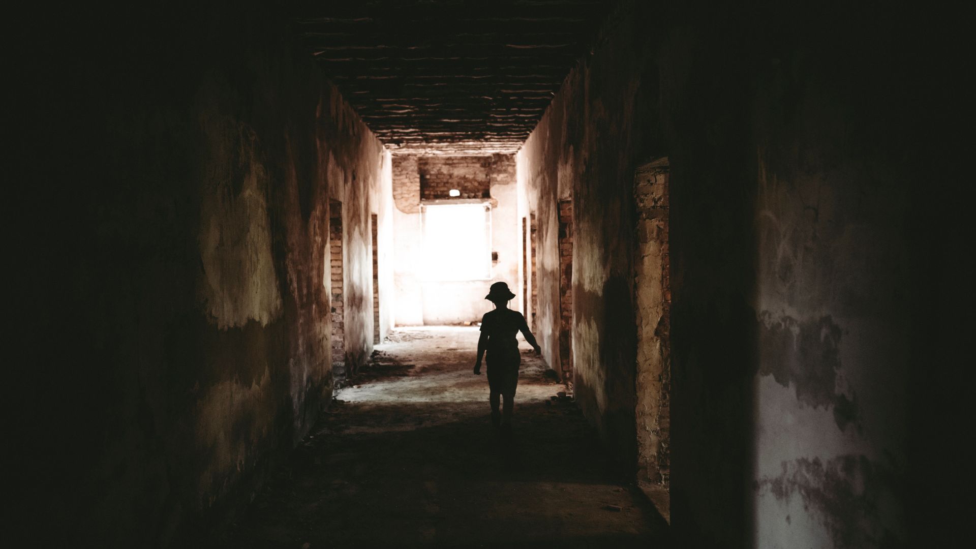 A ghostly figure in a corridor