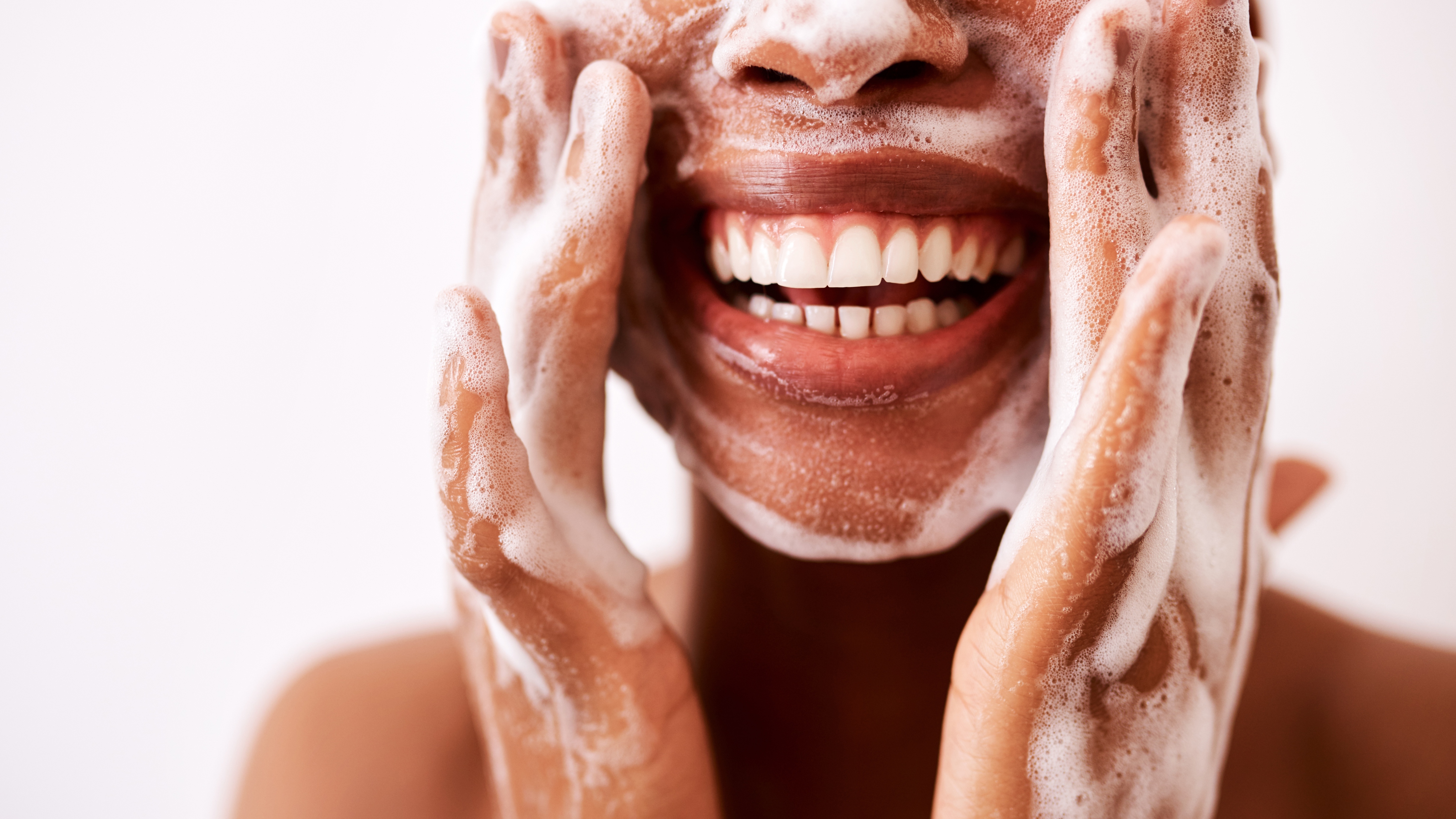 woman washing face