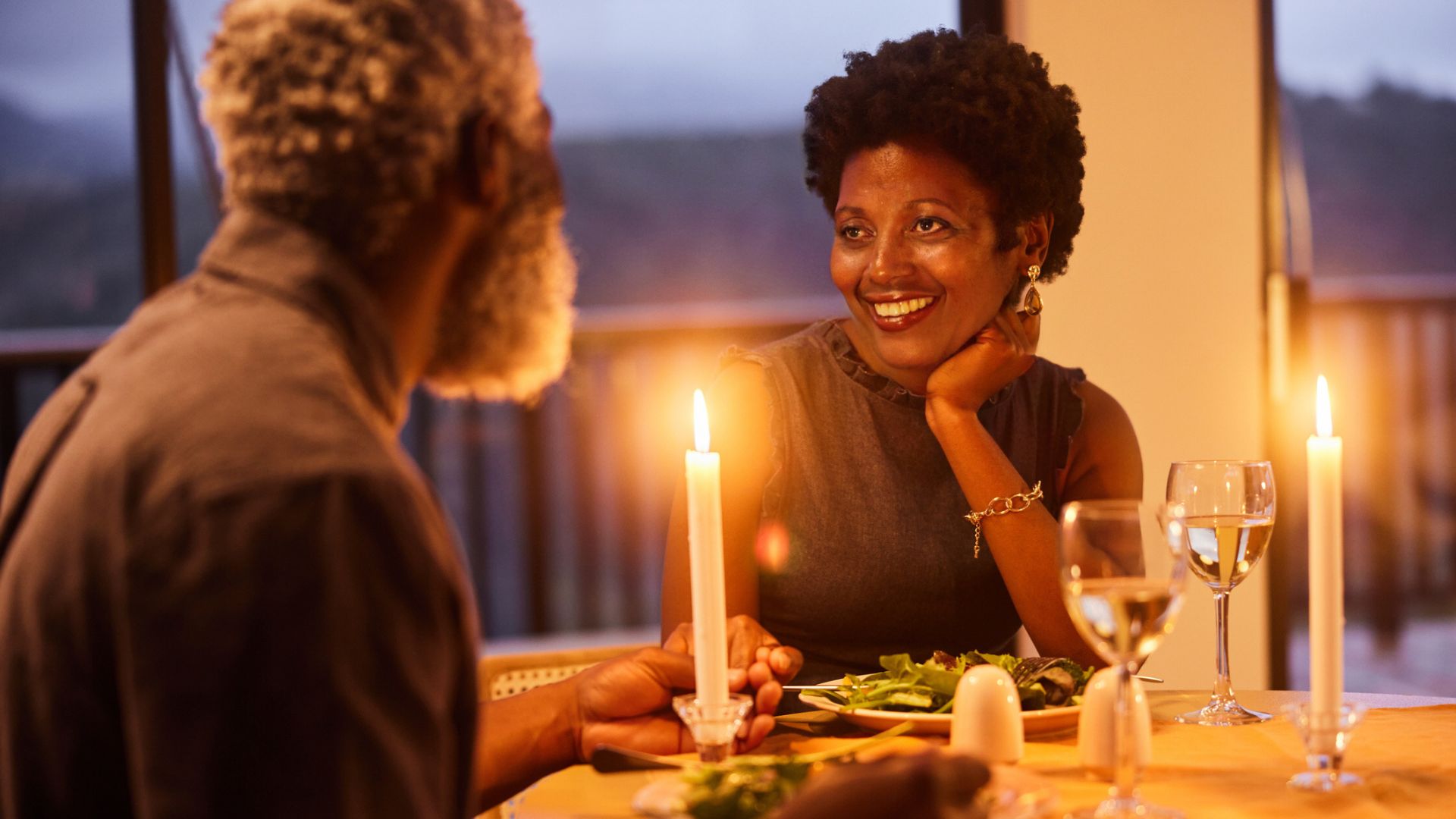 A couple enjoy a fancy meal