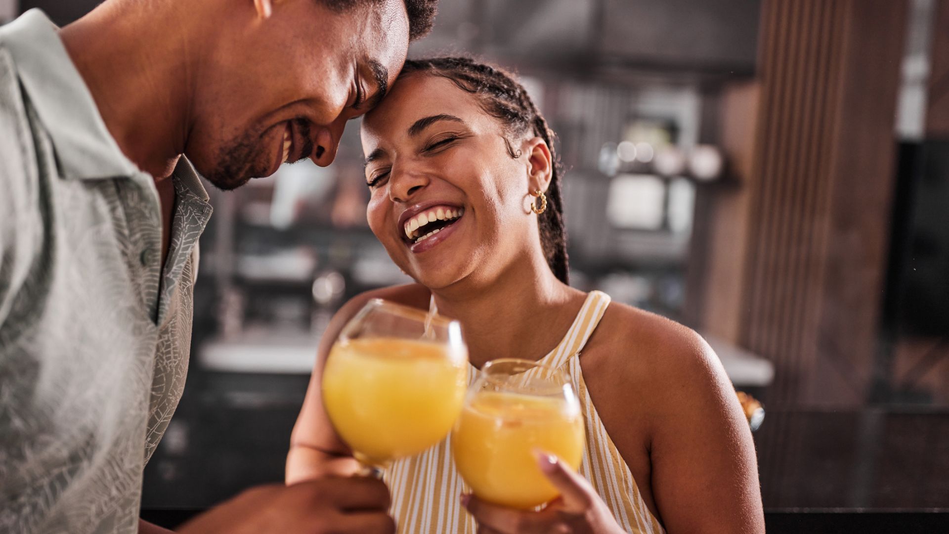 A couple enjoy a cocktail