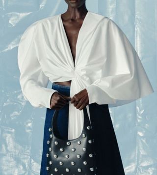 Image of woman wearing white shirt