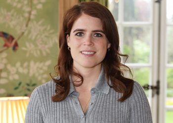 Princess Eugenie showcases navy blue and gold jewellery