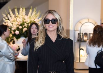 Heidi Klum just wore a pinstriped tailored suit at Cannes