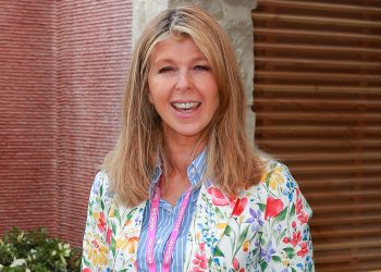 Kate Garraway’s suit and trainers combine comfort and glamour