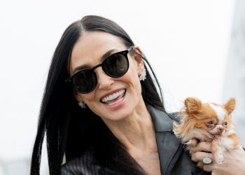 Demi Moore styles straight-leg jeans paired with Birkenstock Bostons