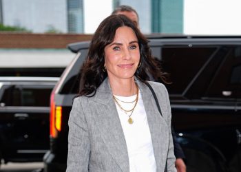 Courteney Cox uses sporty footwear to create a smart casual look