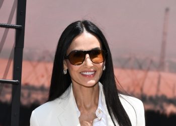 Demi Moore’s chic white blazer and jeans outfit is ideal for summer