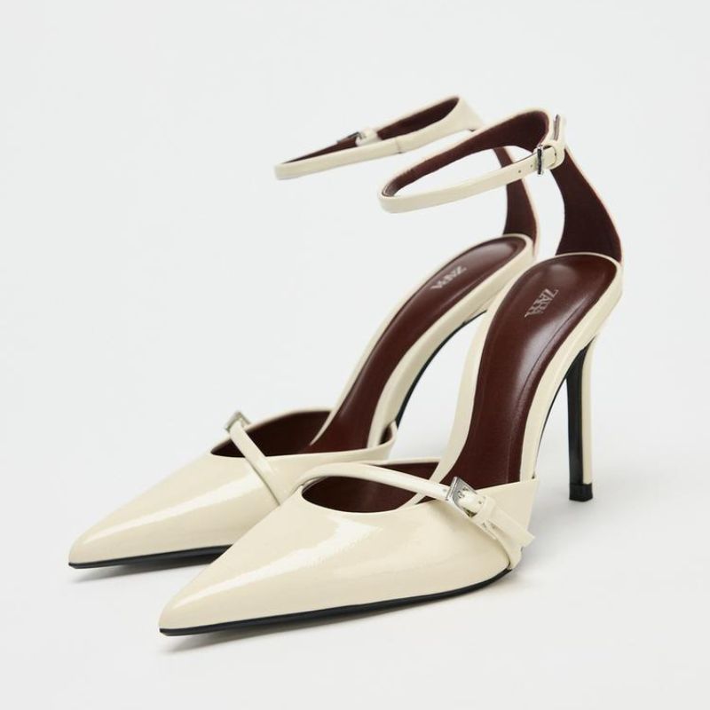 white pointed toe with ankle strap shoe