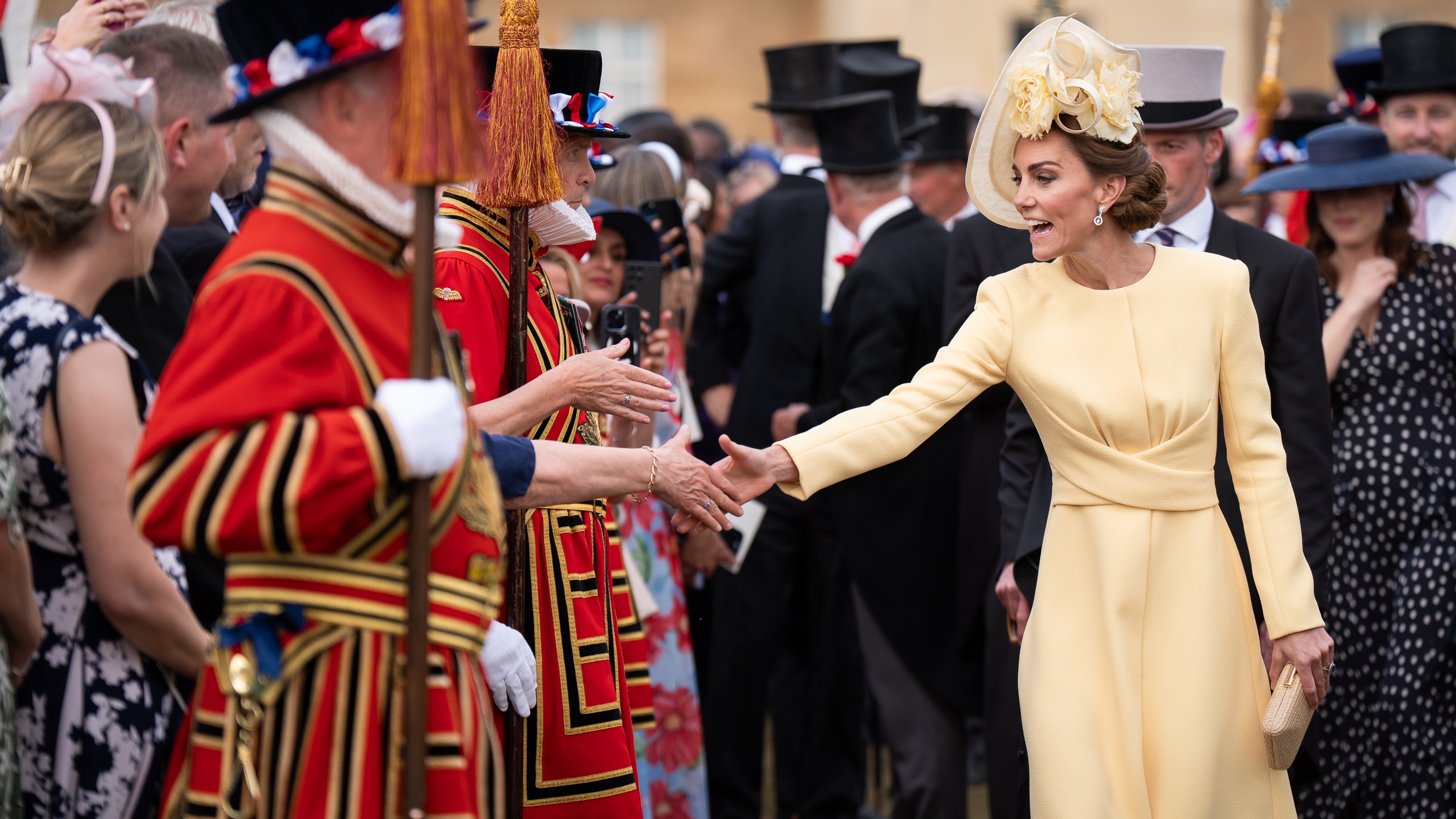Catherine, Princess of Wales greets guests during a Royal Garden Party at Buckingham Palace on May 20, 2025