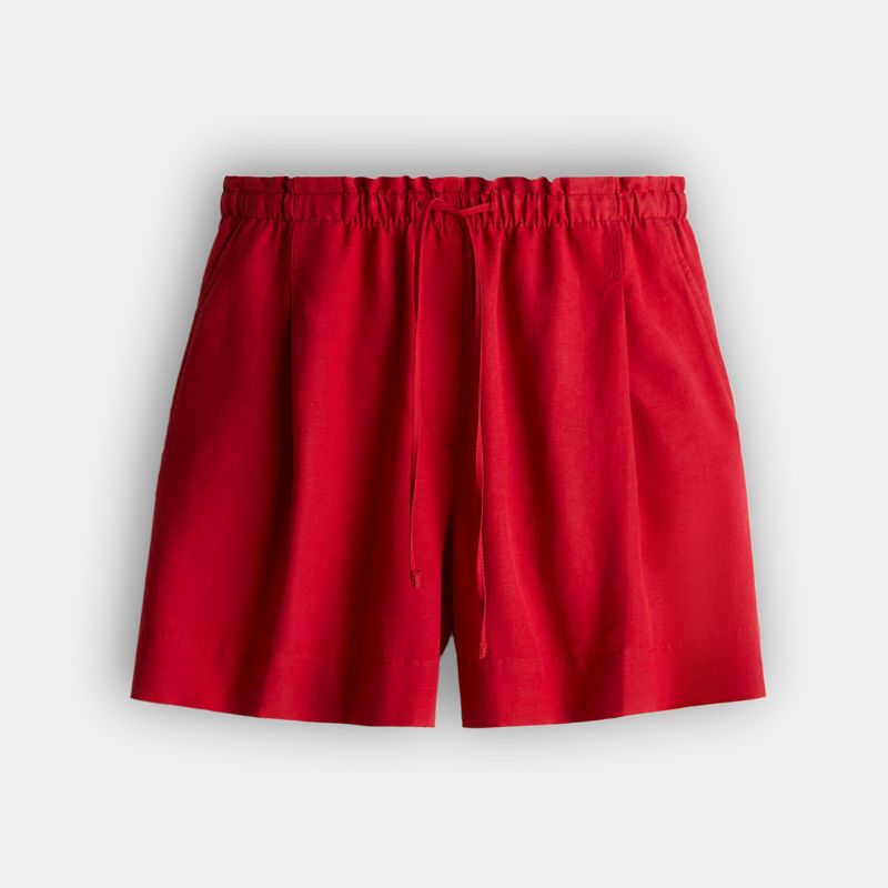 A cutout of H&M red linen shorts