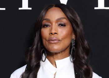 Angela Bassett added a touch of glam to this tailored style
