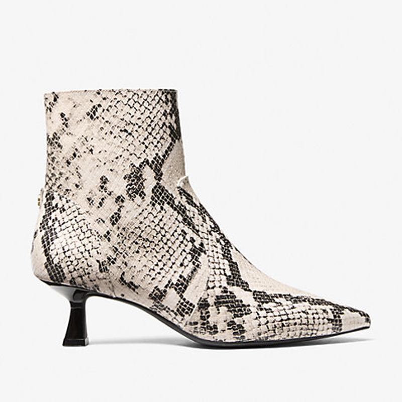 Michael Kors snakeskin boots in cream