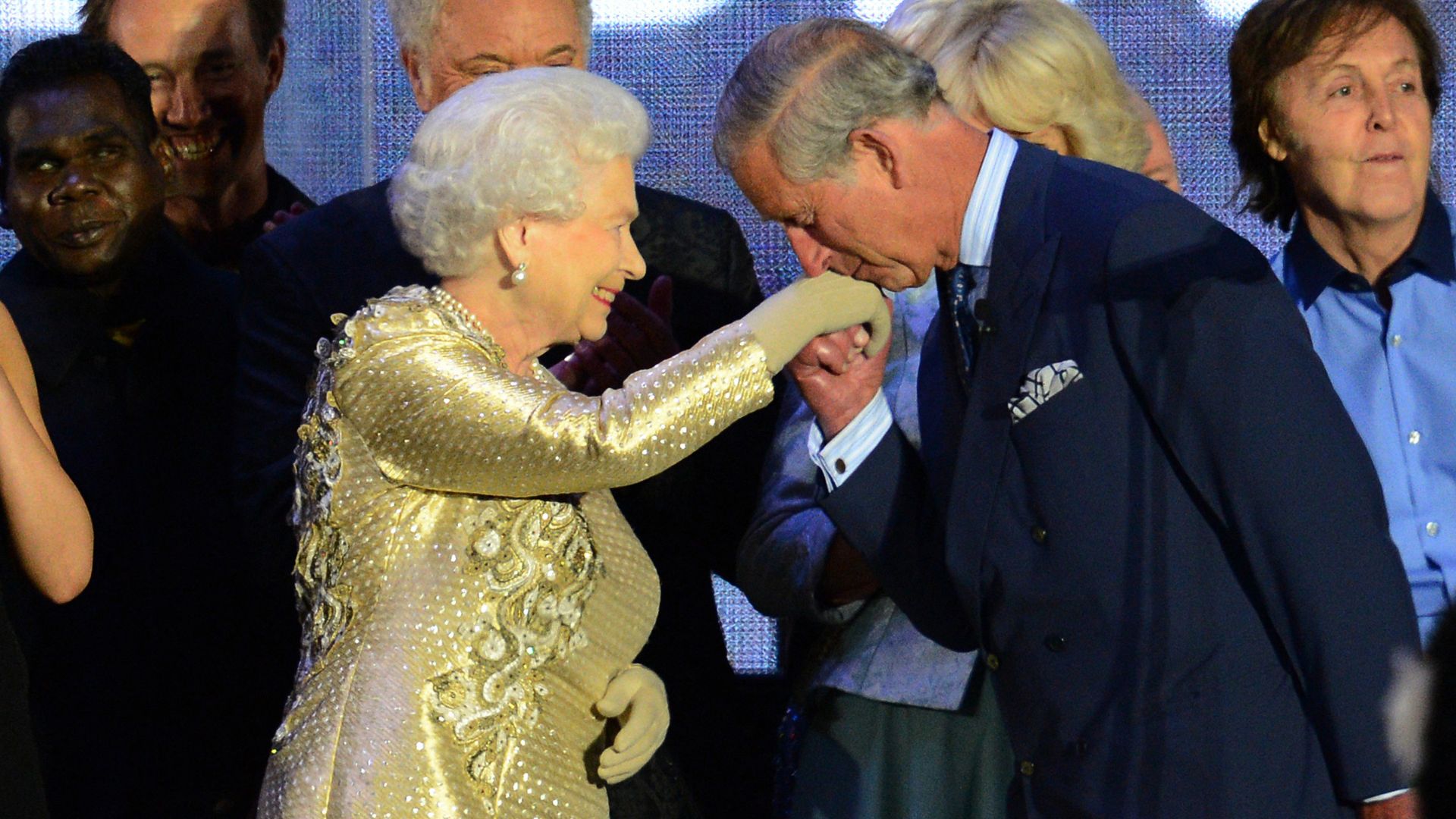 King Charles kisses the hand of Queen Elizabeth II during her jubilee concert