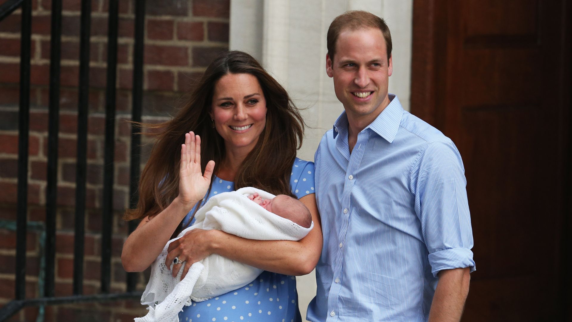Kate Middleton, holding a newly born Prince George, and Prince William outside the Lindo Wing of St Mary's Hospital