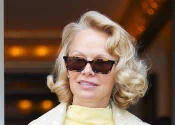 Pamela Anderson dazzles in butter yellow outfit