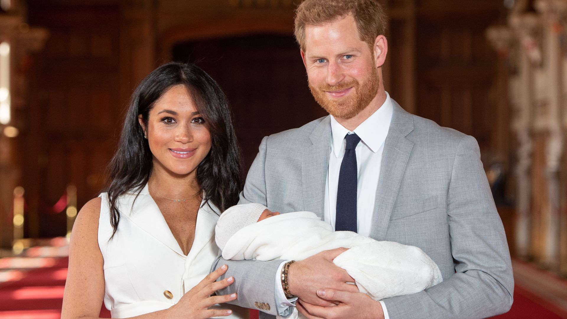 Prince Harry and Meghan Markle introducing Prince Archie to the world in 2019
