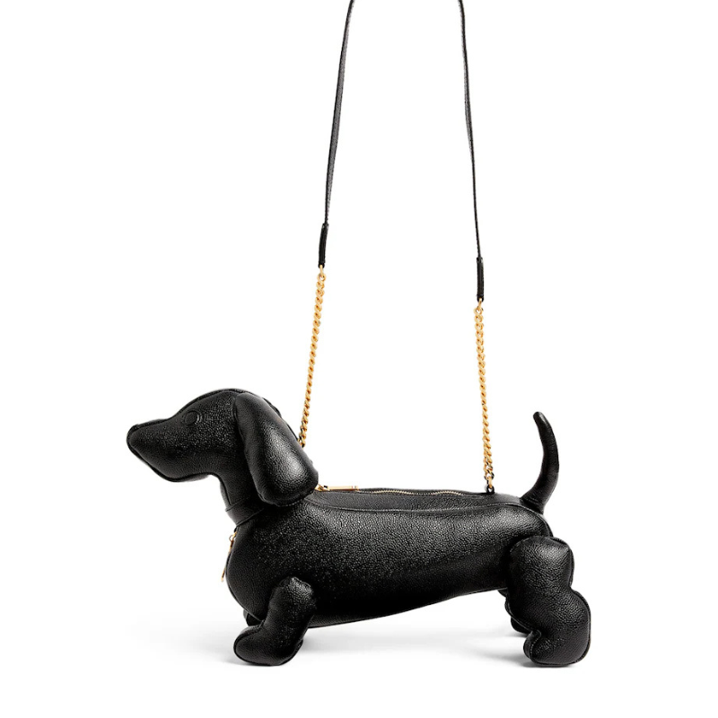 A handbag shaped like a dog