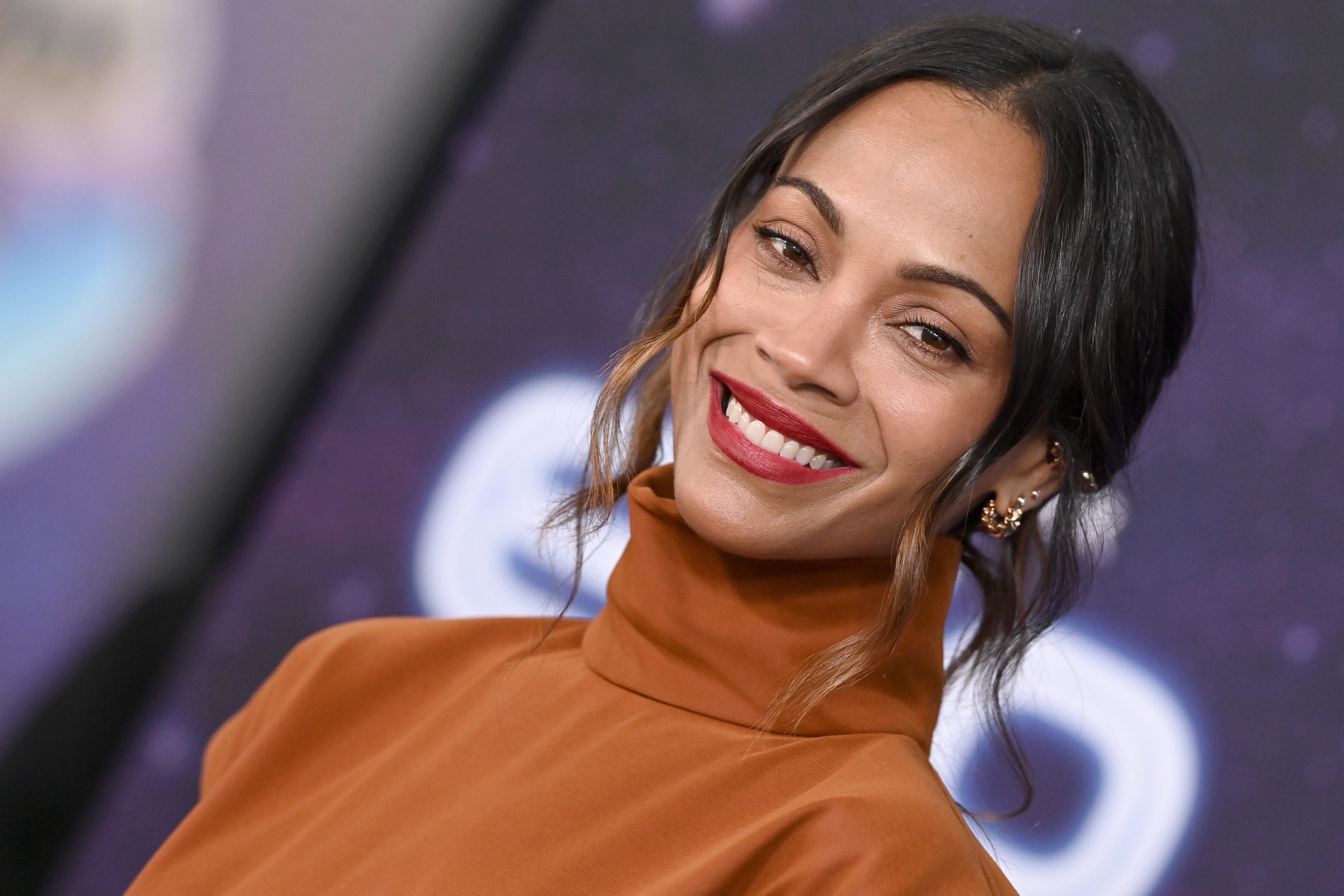 Zoe Salda&amp;ntilde;a attending an event