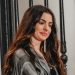 Anne Hathaway makes rainwear look chic in this coat