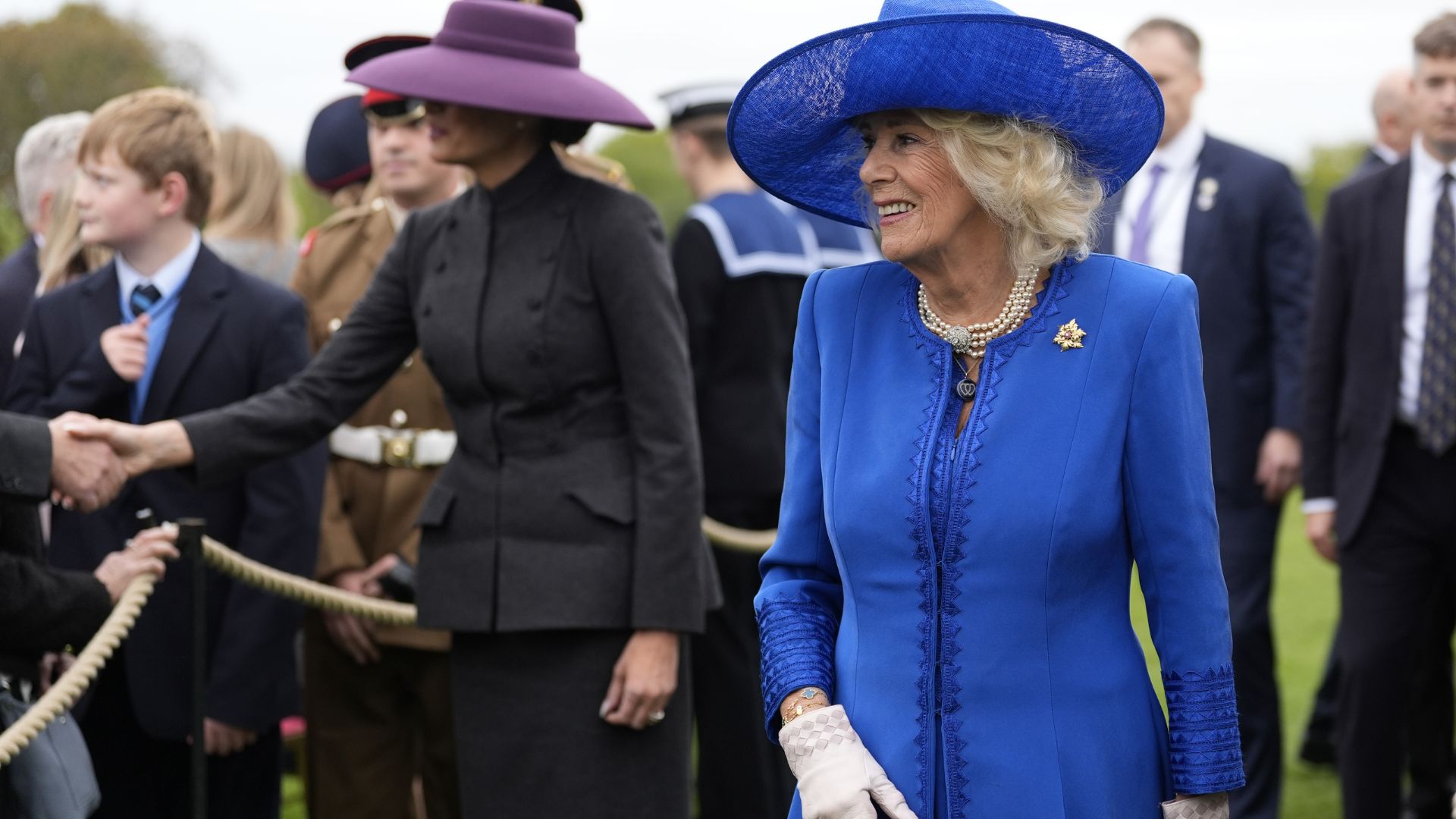 Queen Camilla and First Lady Melania Trump meet members of the Armed forces following a Beating Retreat military ceremony at Windsor Castle