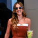 Jessica Alba keeps it classic in tan and white outfit