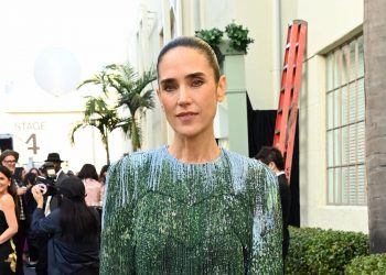 Jennifer Connelly’s boots and mini dress are a winning combo