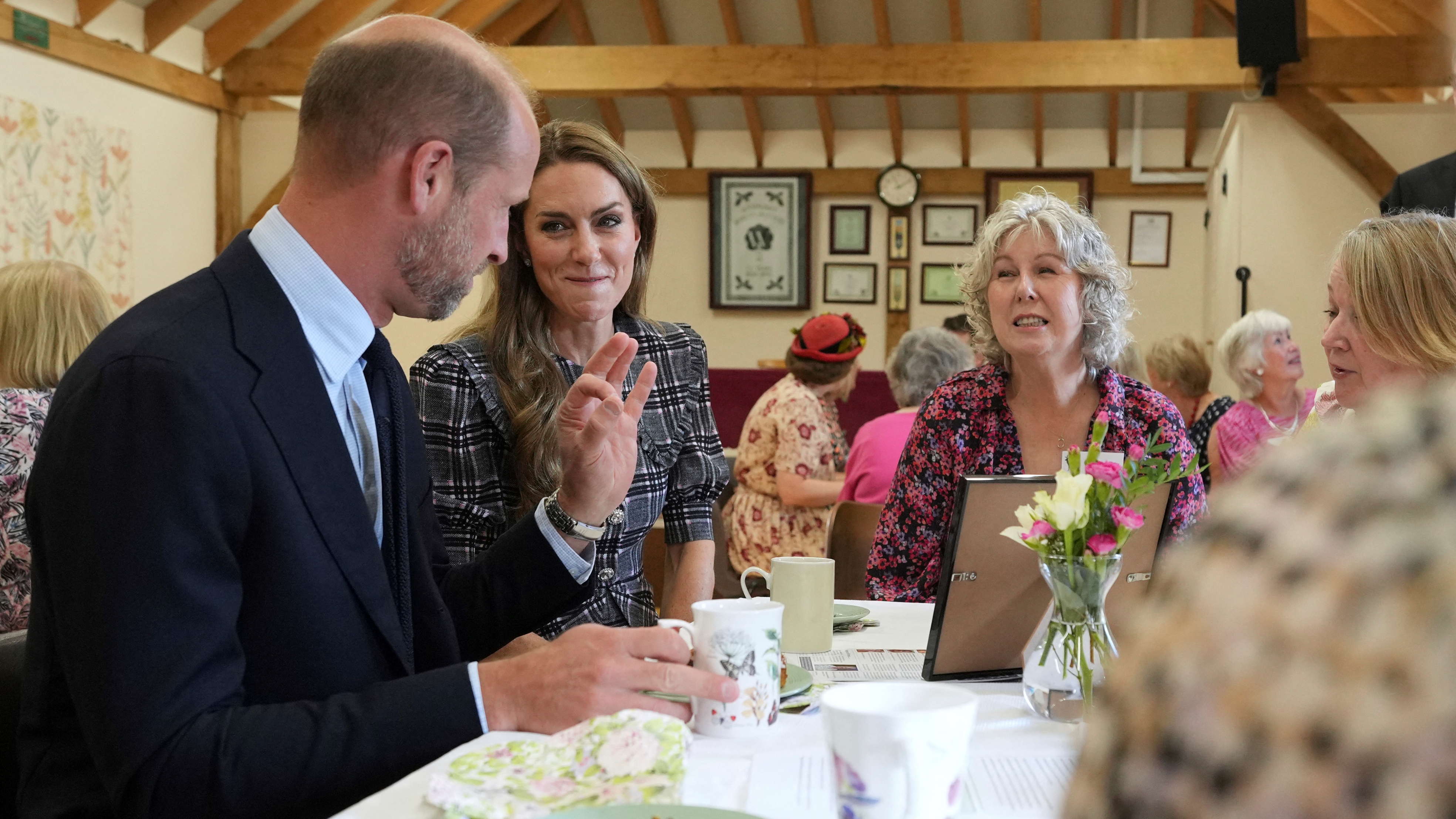Catherine, Princess of Wales and Prince William, speak with members during a visit to the National Federation of Women&#039;s Institute (WI) in Sunningdale on September 8, 2025