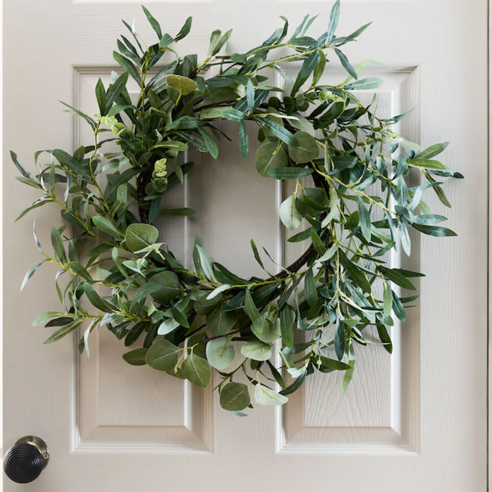 artificial eucalyptus wreath on a door