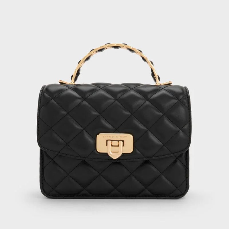 Cressida Quilted Top Handle Bag in Black cut out 